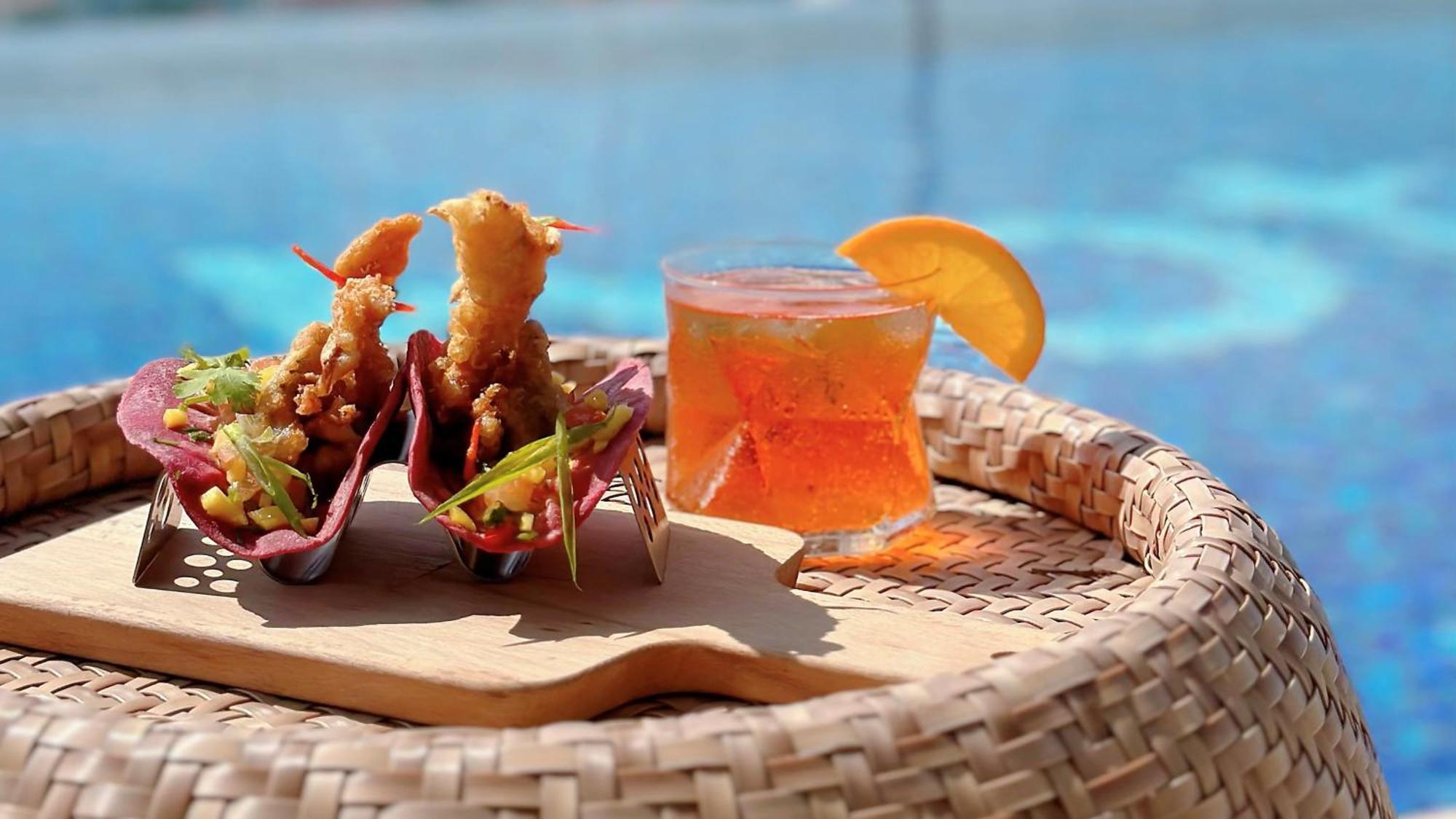 โรงแรมอินดิโก สิงคโปร์ กาตง ภายนอก รูปภาพ A glass of Aperol Spritz