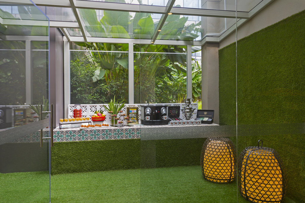 โรงแรมอินดิโก สิงคโปร์ กาตง ภายนอก รูปภาพ The interior of the restaurant